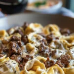 Delicious Cheesesteak Tortellini in Rich Provolone Sauce finished dish