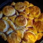 Delicious Peach and Blueberry Cobbler with Crumb Topping finished dish