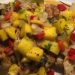 Delightful Grilled Citrus Chicken with Mango Avocado Salsa finished dish