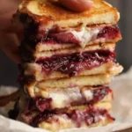 Indulge in Blackberry Balsamic and Brie Grilled Cheese finished dish
