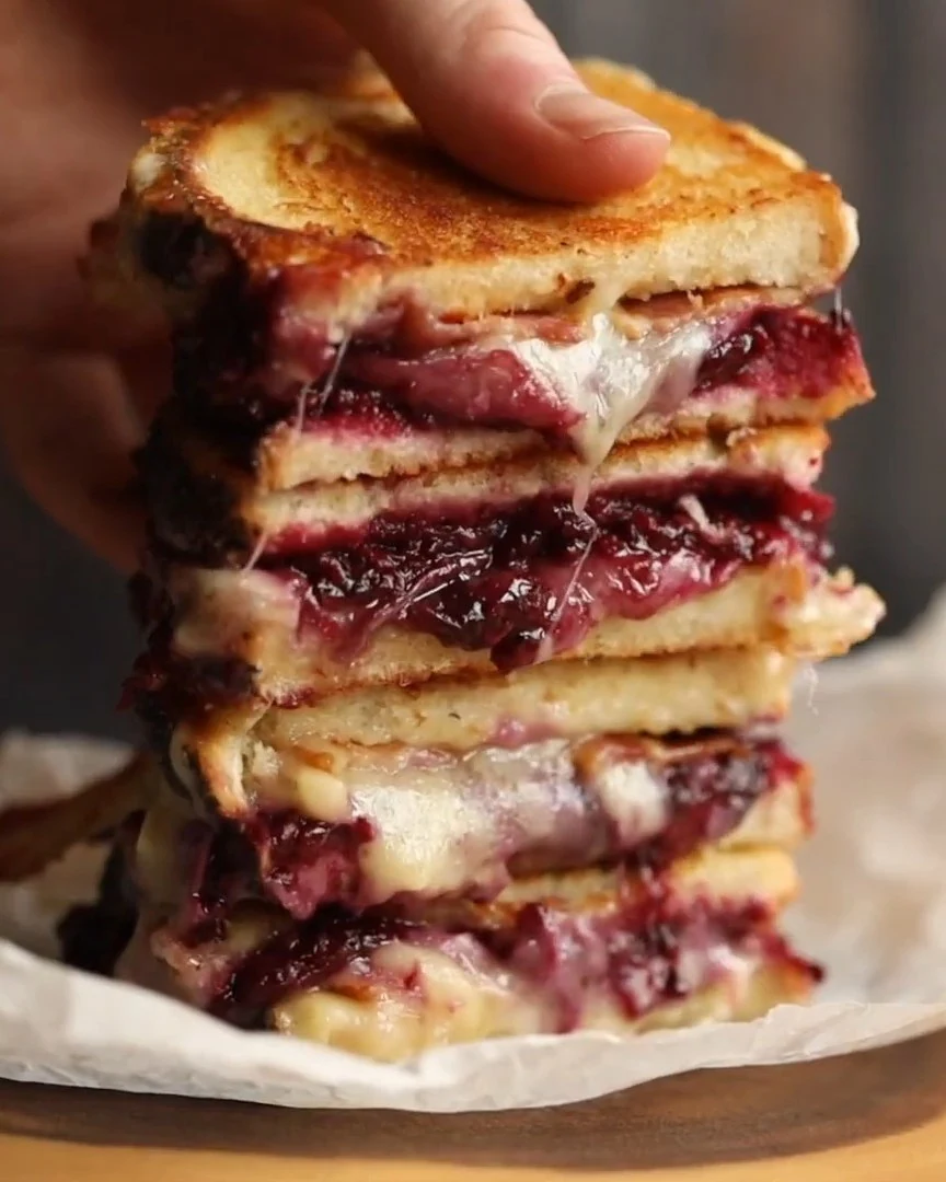 Indulge in Blackberry Balsamic and Brie Grilled Cheese finished dish