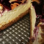 Indulge in Exquisite Lemon Raspberry Cheesecake Today finished dish