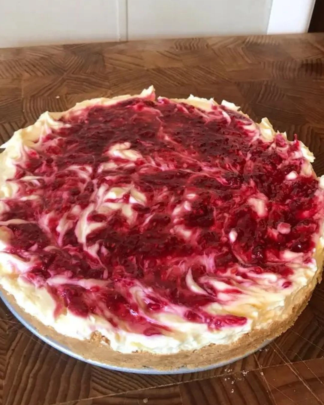 Indulge in Heavenly Raspberry Marble Cheesecake Today finished dish
