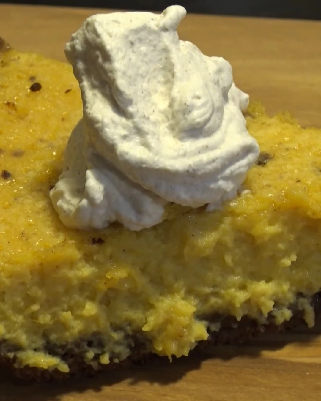 Indulge in Pumpkin Pie Brûlée with Bourbon Vanilla Whipped Cream finished dish