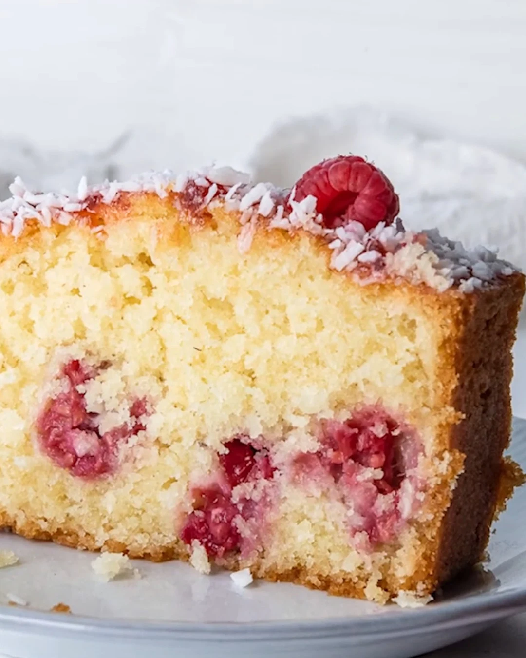 Indulge in Raspberry Swirl Coconut Snowball Cake finished dish