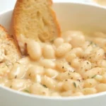 Irresistible Rosemary and Roasted Garlic White Bean Soup finished dish